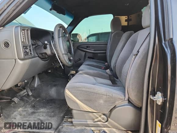 2007 Chevrolet Silverado 1500 Work Truck with VIN 1GCEC14X17Z127629, listed as a Copart auction lot 65522065 with 174,366 mi miles and Salvage title. Bid and sale history available at DreamBid. Image 7.