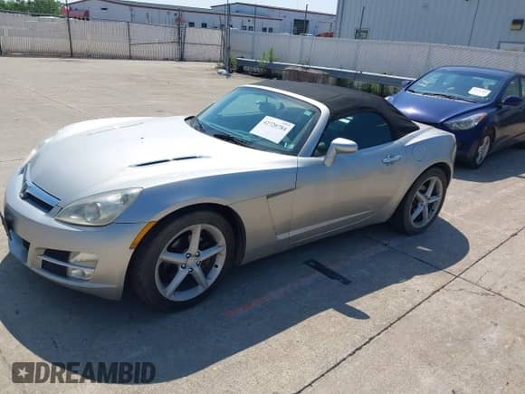 2007 Saturn Sky with VIN 1G8MB35B47Y117853, listed as a IAAI auction lot 42720784 with 255,039 mi miles and . Bid and sale history available at DreamBid. Image 2.