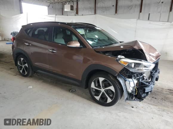 2016 Hyundai Tucson Limited z VIN KM8J33A26GU086636, wystawiony jako Copart lot #67650275 z przebiegiem 79 688 mil mil oraz Szkoda całkowita • Salvage title. Historia ofert i sprzedaży dostępna na DreamBid. Obrazek 4.