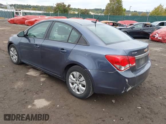 2014 Chevrolet Cruze LS z VIN 1G1PA5SG5E7279519, wystawiony jako IAAI lot #43456106 z przebiegiem 142 862 mil mil oraz . Historia ofert i sprzedaży dostępna na DreamBid. Obrazek 3.