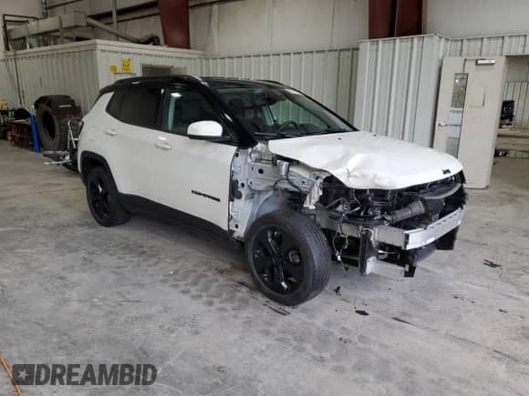 2019 Jeep Compass Latitude with VIN 3C4NJDBB7KT733970, listed as a Copart auction lot 87241235 with 72,963 mi miles and Salvage title. Bid and sale history available at DreamBid. Image 4.