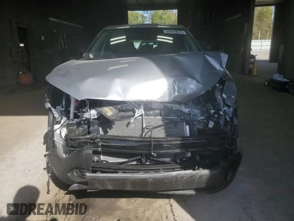 2024 Toyota Corolla Cross L with VIN 7MUAAABGXRV092414, listed as a Copart auction lot 84943015 with 9,698 mi miles and Salvage title. Bid and sale history available at DreamBid. Image 5.