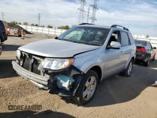 2010 Subaru Forester X Premium with VIN JF2SH6CC9AH721383, listed as a Copart auction lot 84710785 with 104,942 mi miles and Salvage title. Bid and sale history available at DreamBid. Image 1.