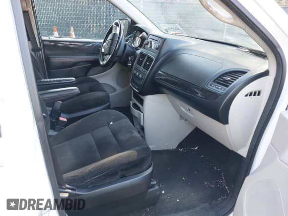 2014 Dodge Grand Caravan SE with VIN 2C4RDGBG3ER335278, listed as a IAAI auction lot 42049346 with 100,813 mi miles and . Bid and sale history available at DreamBid. Image 5.