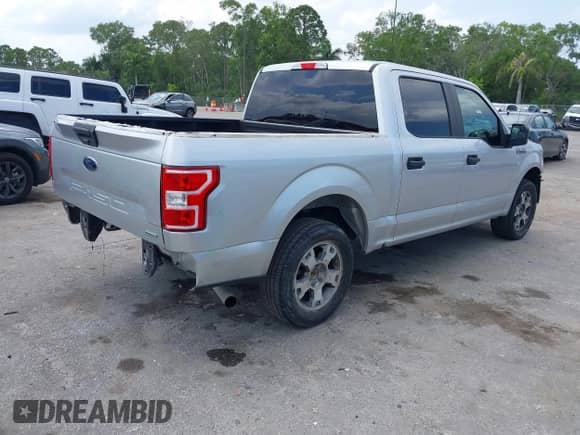2018 Ford F-150 XL with VIN 1FTEW1CP6JFA35949, listed as a IAAI auction lot 42322549 with 104,044 mi miles and . Bid and sale history available at DreamBid. Image 4.