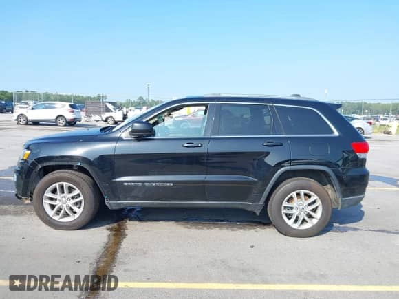 2018 Jeep Grand Cherokee Altitude with VIN 1C4RJEAGXJC247040, listed as a IAAI auction lot 42928303 with 84,955 mi miles and . Bid and sale history available at DreamBid. Image 14.