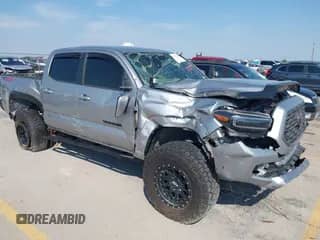 2021 Toyota Tacoma SR with VIN 5TFCZ5AN1MX265811, listed as a IAAI auction lot 42687549 with Not provided miles and . Bid and sale history available at DreamBid. Image 1.