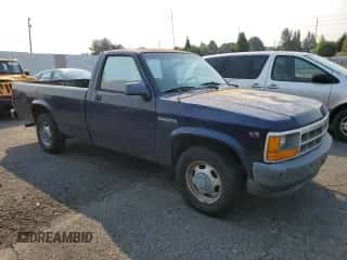 1994 Dodge Dakota z VIN 1B7FL26XXRS606540, wystawiony jako Copart lot #70103064 z przebiegiem 123 850 mil mil oraz Czysty tytuł • Clean title. Historia ofert i sprzedaży dostępna na DreamBid. Obrazek 4.