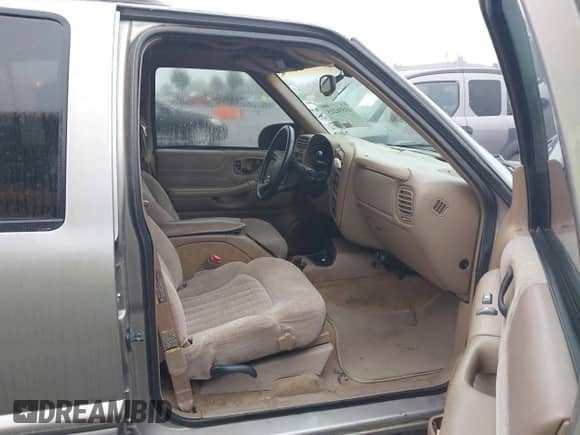 1999 Chevrolet Blazer LT with VIN 1GNCS13W9X2158646, listed as a IAAI auction lot 43550215 with 263,700 mi miles and . Bid and sale history available at DreamBid. Image 5.