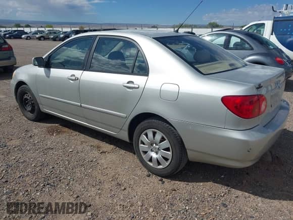 2004 Toyota Corolla CE z VIN 1NXBR38E94Z280656, wystawiony jako IAAI lot #43231431 z przebiegiem 220 605 mil mil oraz . Historia ofert i sprzedaży dostępna na DreamBid. Obrazek 3.