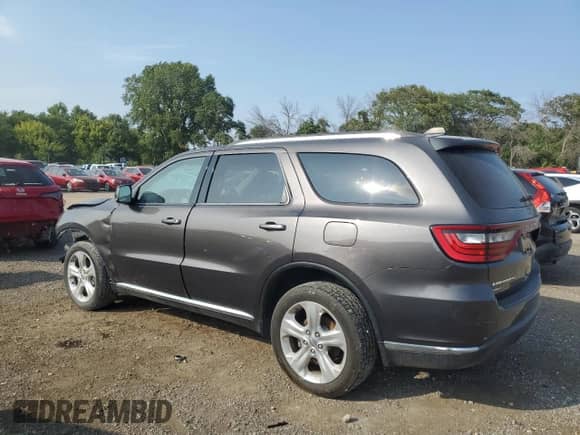 2014 Dodge Durango Limited with VIN 1C4RDJDG4EC306990, listed as a Copart auction lot 71255045 with Not provided miles and Salvage title. Bid and sale history available at DreamBid. Image 2.