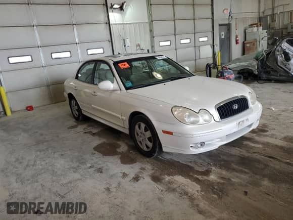 2002 Hyundai Sonata z VIN KMHWF25HX2A716609, wystawiony jako Copart lot #78454424 z przebiegiem 283 736 mil mil oraz Czysty tytuł • Clean title. Historia ofert i sprzedaży dostępna na DreamBid. Obrazek 4.