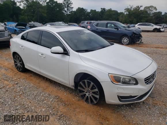 2015 Volvo S60 T5 Drive-E Platinum с VIN YV140MFM0F2355504, выставлен на аукционе Copart как лот 60310125 с пробегом 93 375 миль миль и Списание • Salvage title. История ставок и продаж доступна на DreamBid. Изображение 4.