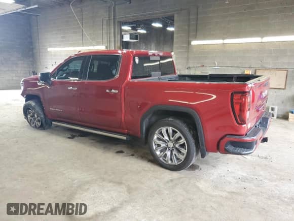 2023 GMC Sierra 1500 Denali with VIN 3GTUUGED5PG258210, listed as a Copart auction lot 81488935 with 57,169 mi miles and Salvage title. Bid and sale history available at DreamBid. Image 2.