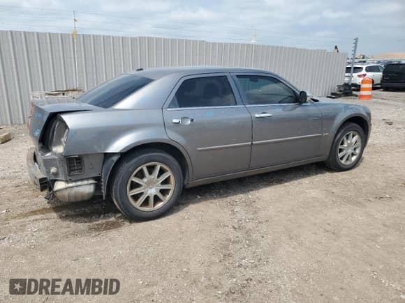 2010 Chrysler 300 Touring Signature с VIN 2C3CK5CV5AH318998, выставлен на аукционе Copart как лот 67943045 с пробегом 119 990 миль миль и Списание • Salvage title. История ставок и продаж доступна на DreamBid. Изображение 3.