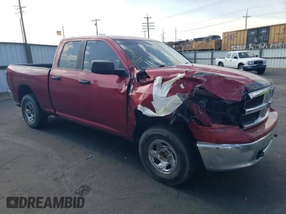 2009 Dodge 1500 SLT with VIN 1D3HV18T09S729164, listed as a Copart auction lot 63945785 with 149,167 mi miles and Salvage title. Bid and sale history available at DreamBid. Image 4.