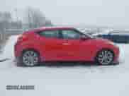 2014 Hyundai Veloster z VIN KMHTC6AD8EU214612, wystawiony jako IAAI lot #41258820 z przebiegiem 61 984 mil mil oraz . Historia ofert i sprzedaży dostępna na DreamBid. Obrazek 13.
