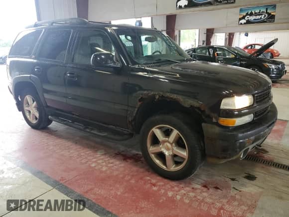 2004 Chevrolet Tahoe LS с VIN 1GNEK13T04R303106, выставлен на аукционе Copart как лот 67233675 с пробегом 213 888 миль миль и Списание • Salvage title. История ставок и продаж доступна на DreamBid. Изображение 4.