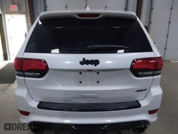 2018 Jeep Grand Cherokee SRT z VIN 1C4RJFDJXJC154046, wystawiony jako IAAI lot #42062169 z przebiegiem 64 953 mil mil oraz . Historia ofert i sprzedaży dostępna na DreamBid. Obrazek 16.