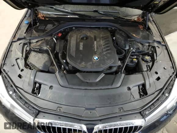 2017 BMW 7 Series 740i xDrive with VIN WBA7E4C53HGU99097, listed as a Copart auction lot 43945695 with 117,790 mi miles and Salvage title. Bid and sale history available at DreamBid. Image 11.