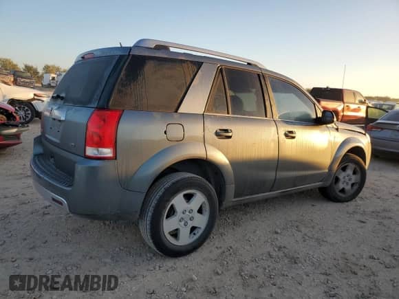 2007 Saturn VUE V6 z VIN 5GZCZ53457S841114, wystawiony jako Copart lot #77676254 z przebiegiem 130 615 mil mil oraz Szkoda całkowita • Salvage title. Historia ofert i sprzedaży dostępna na DreamBid. Obrazek 3.