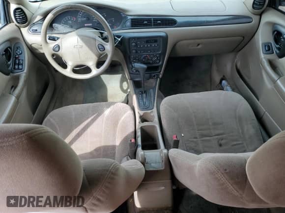 2004 Chevrolet Malibu Classic z VIN 1G1ND52F64M512250, wystawiony jako Copart lot #49432135 z przebiegiem 144 769 mil mil oraz Szkoda całkowita • Salvage title. Historia ofert i sprzedaży dostępna na DreamBid. Obrazek 8.