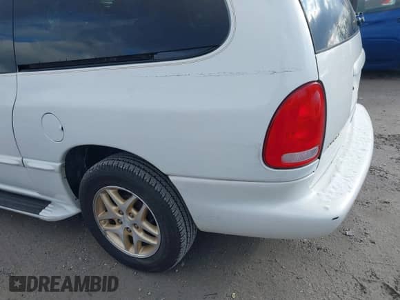 1998 Dodge Caravan LE with VIN 1B4GP54L7WB698340, listed as a IAAI auction lot 41252162 with 99,073 mi miles and . Bid and sale history available at DreamBid. Image 6.