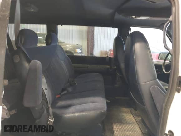1999 Chevrolet Astro z VIN 1GNDM19W9XB138046, wystawiony jako IAAI lot #42493817 z przebiegiem 187 616 mil mil oraz . Historia ofert i sprzedaży dostępna na DreamBid. Obrazek 8.