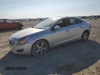 2012 Volvo S60 T5 with VIN YV1622FS1C2102533, listed as a Copart auction lot 84743595 with 124,756 mi miles and Salvage title. Bid and sale history available at DreamBid. Image 1.