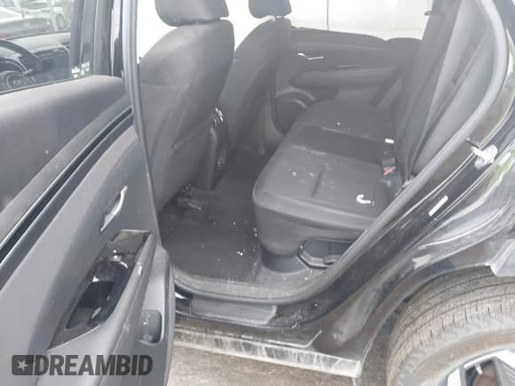 2022 Hyundai Tucson SEL Convenience with VIN KM8JFCA13NU061334, listed as a IAAI auction lot 43309098 with 75,772 mi miles and . Bid and sale history available at DreamBid. Image 8.