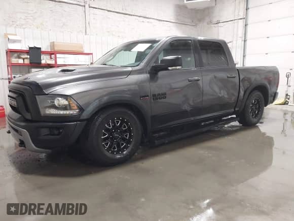 2016 Ram 1500 Rebel z VIN 1C6RR7YT2GS216684, wystawiony jako IAAI lot #41892815 z przebiegiem 79 648 mil mil oraz . Historia ofert i sprzedaży dostępna na DreamBid. Obrazek 2.
