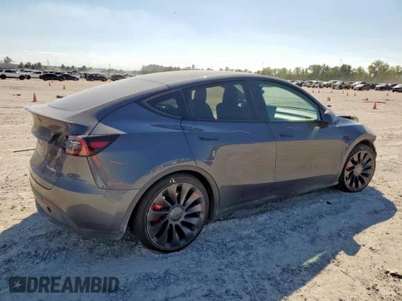 2022 Tesla Model Y Performance z VIN 7SAYGDEF3NF443970, wystawiony jako Copart lot #85561825 z przebiegiem 19 750 mil mil oraz Szkoda całkowita • Salvage title. Historia ofert i sprzedaży dostępna na DreamBid. Obrazek 3.