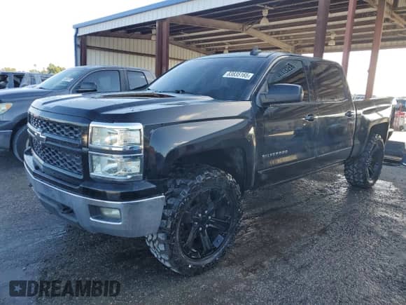 2015 Chevrolet Silverado 1500 LT with VIN 3GCUKREH8FG412928, listed as a Copart auction lot 83835165 with 168,723 mi miles and Salvage title. Bid and sale history available at DreamBid. Image 1.