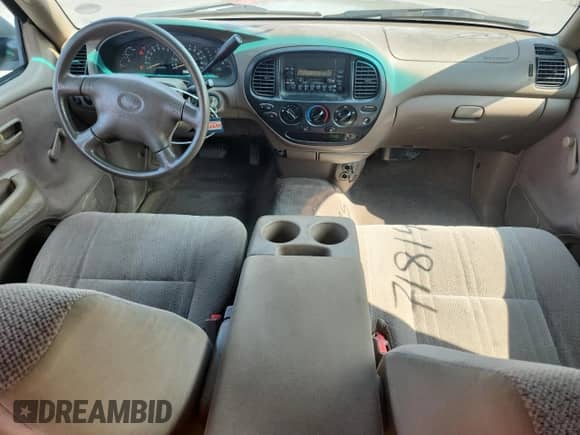 2002 Toyota Tundra SR5 z VIN 5TBRN34102S254202, wystawiony jako Copart lot #71814075 z przebiegiem 167 582 mil mil oraz Szkoda całkowita • Salvage title. Historia ofert i sprzedaży dostępna na DreamBid. Obrazek 8.
