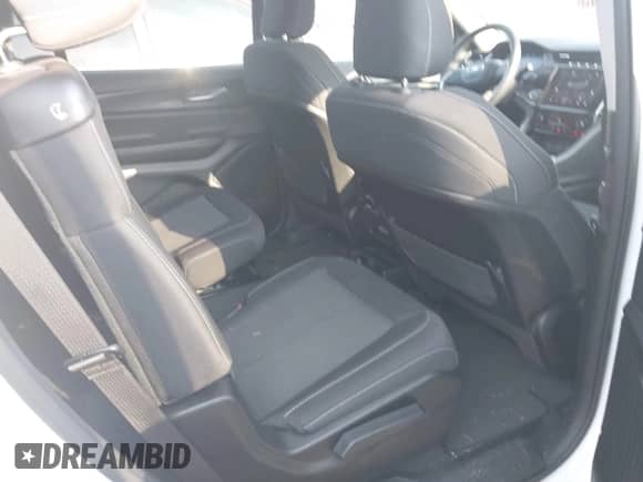 2023 Jeep Grand Cherokee Laredo with VIN 1C4RJKAG5P8881804, listed as a IAAI auction lot 42574642 with 54,046 mi miles and . Bid and sale history available at DreamBid. Image 8.