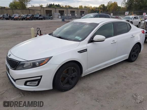2015 Kia Optima LX z VIN KNAGM4A77F5546924, wystawiony jako IAAI lot #43393812 z przebiegiem 140 717 mil mil oraz . Historia ofert i sprzedaży dostępna na DreamBid. Obrazek 2.