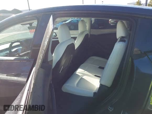 2023 Tesla Model Y Long Range with VIN 7SAYGAEE9PF662232, listed as a IAAI auction lot 43442303 with 42,636 mi miles and . Bid and sale history available at DreamBid. Image 8.