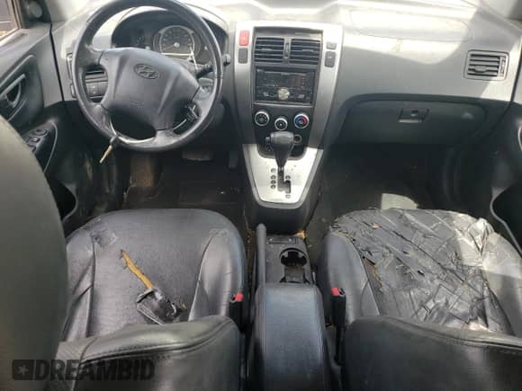 2009 Hyundai Tucson with VIN KM8JM12DX9U147832, listed as a Copart auction lot 61603545 with Not provided miles and Salvage title. Bid and sale history available at DreamBid. Image 8.