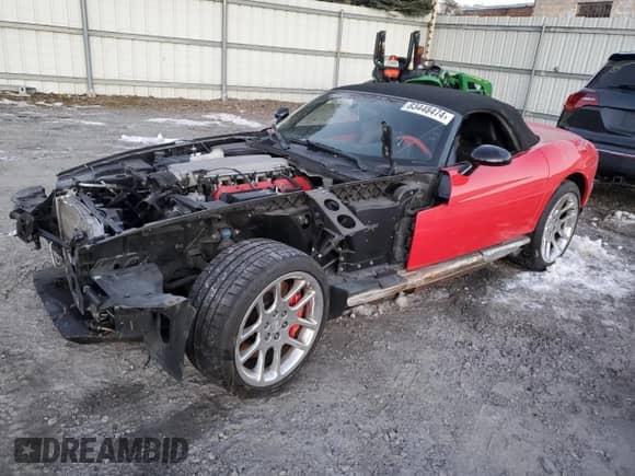 2004 Dodge Viper SRT-10 with VIN 1B3JZ65Z54V102196, listed as a Copart auction lot 83448474 with 72,662 mi miles and Salvage title. Bid and sale history available at DreamBid. Image 1.