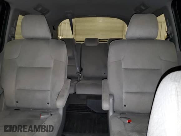 2014 Honda Odyssey LX z VIN 5FNRL5H21EB007064, wystawiony jako Copart lot #69064535 z przebiegiem 26 457 mil mil oraz Szkoda całkowita • Salvage title. Historia ofert i sprzedaży dostępna na DreamBid. Obrazek 10.