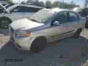 2011 Chevrolet Aveo 1LT with VIN KL1TD5DE4BB142595, listed as a Copart auction lot 73681244 with 142,436 mi miles and Salvage title. Bid and sale history available at DreamBid. Image 1.