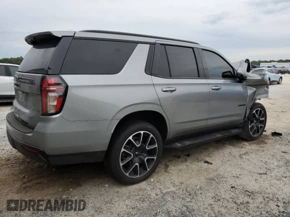 2023 Chevrolet Tahoe RST с VIN 1GNSCRKDXPR543499, выставлен на аукционе Copart как лот 72900354 с пробегом 17 186 миль миль и Списание • Salvage title. История ставок и продаж доступна на DreamBid. Изображение 3.