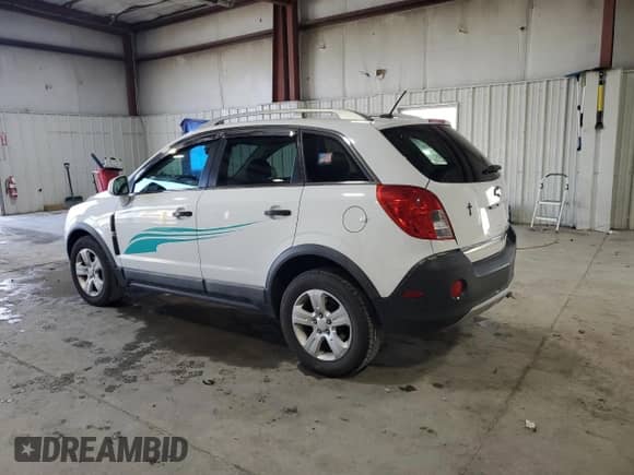 2013 Chevrolet Captiva Sport LS z VIN 3GNAL2EK7DS598045, wystawiony jako Copart lot #89560915 z przebiegiem 113 105 mil mil oraz Szkoda całkowita • Salvage title. Historia ofert i sprzedaży dostępna na DreamBid. Obrazek 2.