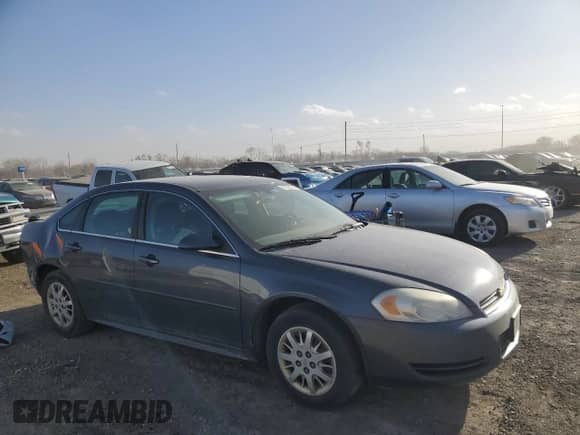 2010 Chevrolet Impala Police Police with VIN 2G1WD5EM1A1183009, listed as a Copart auction lot 47126735 with 111,620 mi miles and Salvage title. Bid and sale history available at DreamBid. Image 4.