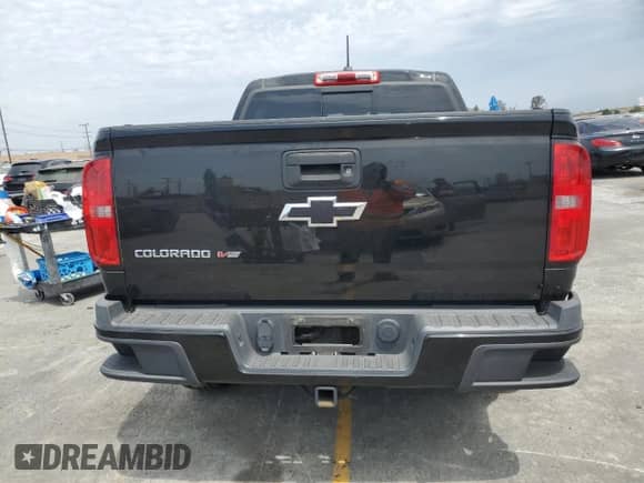 2017 Chevrolet Colorado 2WD Z71 with VIN 1GCGSDEN4H1245846, listed as a Copart auction lot 58846765 with 100,559 mi miles and Salvage title. Bid and sale history available at DreamBid. Image 6.