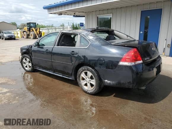 2015 Chevrolet Impala LS with VIN 2G1WA5E38F1145106, listed as a Copart auction lot 61351435 with 145,965 mi miles and Salvage title. Bid and sale history available at DreamBid. Image 2.
