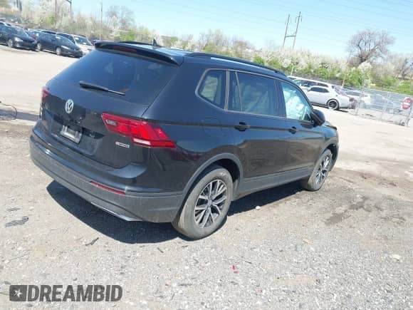 2021 Volkswagen Tiguan S with VIN 3VV0B7AXXMM040752, listed as a IAAI auction lot 41988353 with 51,757 mi miles and . Bid and sale history available at DreamBid. Image 4.