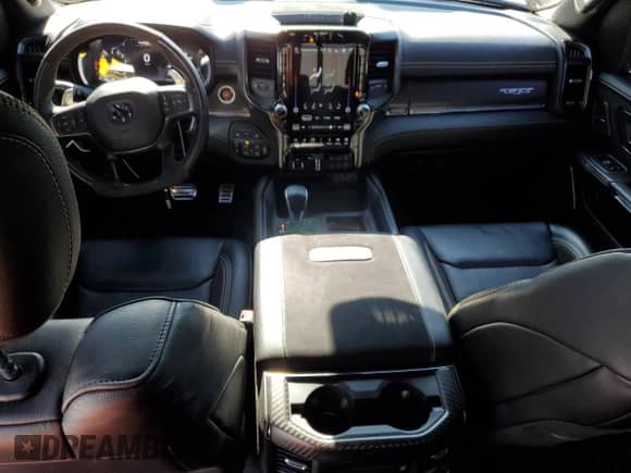 2023 Ram 1500 TRX z VIN 1C6SRFU98PN579883, wystawiony jako Copart lot #69012645 z przebiegiem 22 340 mil mil oraz Czysty tytuł • Clean title. Historia ofert i sprzedaży dostępna na DreamBid. Obrazek 8.