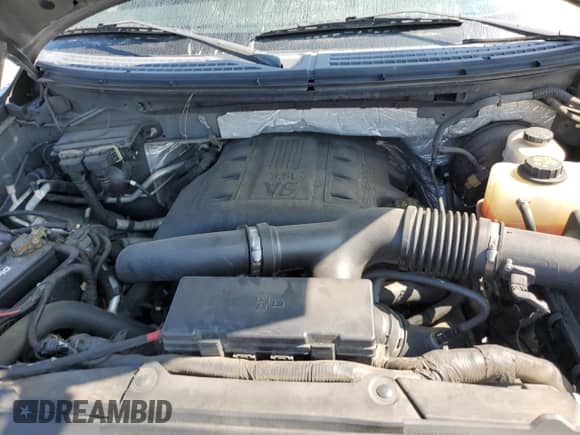 2011 Ford F-150 XLT с VIN 1FTFW1CT4BKD72842, выставлен на аукционе Copart как лот 69568615 с пробегом 145 827 миль миль и Списание • Salvage title. История ставок и продаж доступна на DreamBid. Изображение 11.