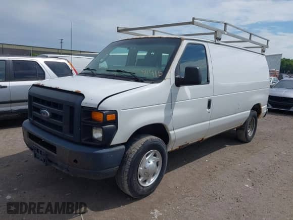 2013 Ford Econoline Cargo Commercial with VIN 1FTNE2EW8DDB33894, listed as a IAAI auction lot 42841415 with 224,026 mi miles and . Bid and sale history available at DreamBid. Image 2.